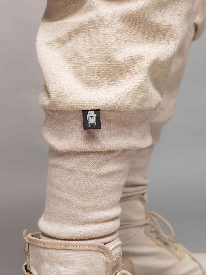 Desert Warlock Men's Cargo Pants in Sand Natural Linen with Drop Crotch, 10 Pockets Design, Ribbed Calf Supports and Belt with Metal Buckle