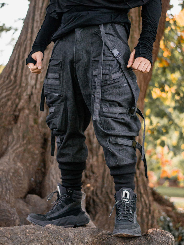 Angled View of Haides Men's Cargo Pants with Straps and Buckles, Drop Crotch Fit, Multi Pocket Design - Rags by Jak