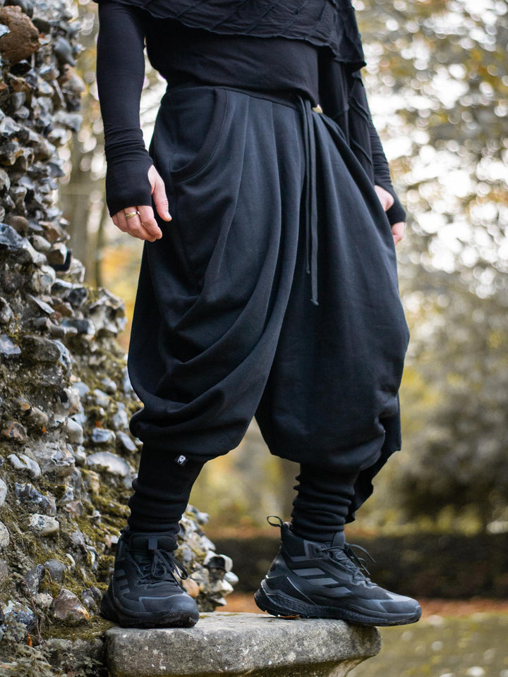 Hattori Avant Garde Ninja Pants with Drop Crotch, Japanese Style Trousers in Black - image showing the ninja pants worn outdoors