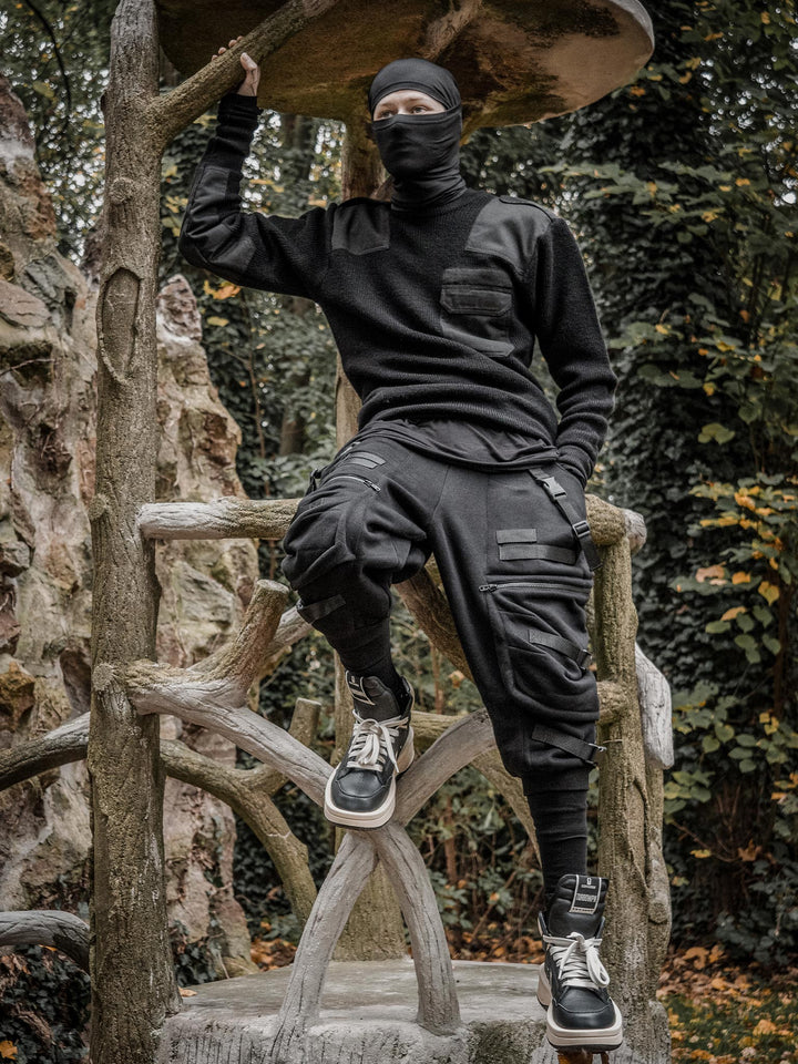 Zye Men's Drop Crotch Joggers in Black, featuring Straps and Buckles, and a functional 4 pockets design - full body styled image with the Fusion Long Sleeve T-Shirt and Balaclava