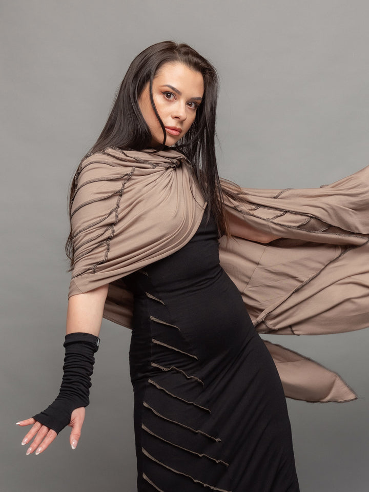 Athea oversized wrap over scarf dress in taupe with black contrast stitch - movement pose close-up