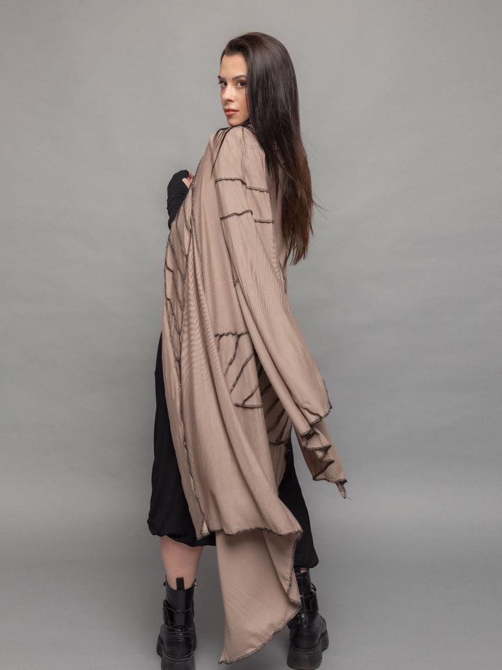 Athea oversized wrap over scarf dress in taupe with black contrast stitch - side view when worn over the shoulders