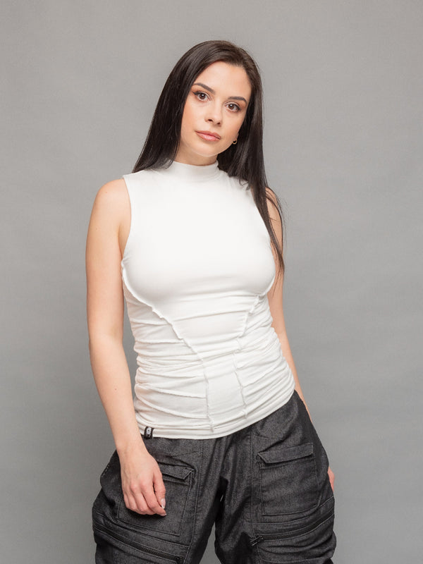 Kira high neck tank top in white with a body hugging silhouette and overlock stitch details on the waist sides for an hourglass effect - front view
