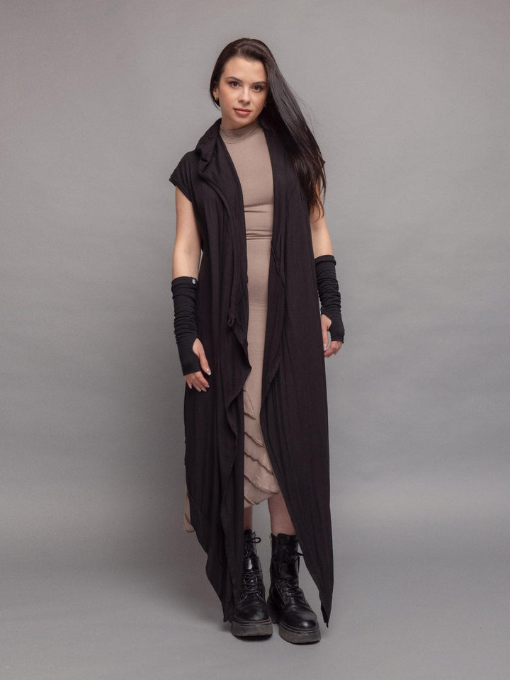 Medina avant garde cloak with hood, wrap-over design with draped effect and asymmetric hem in black - full body pose with open front