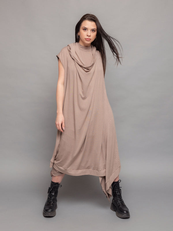 Medina avant garde cloak with hood, wrap-over design with draped effect and asymmetric hem in taupe - front pose full body