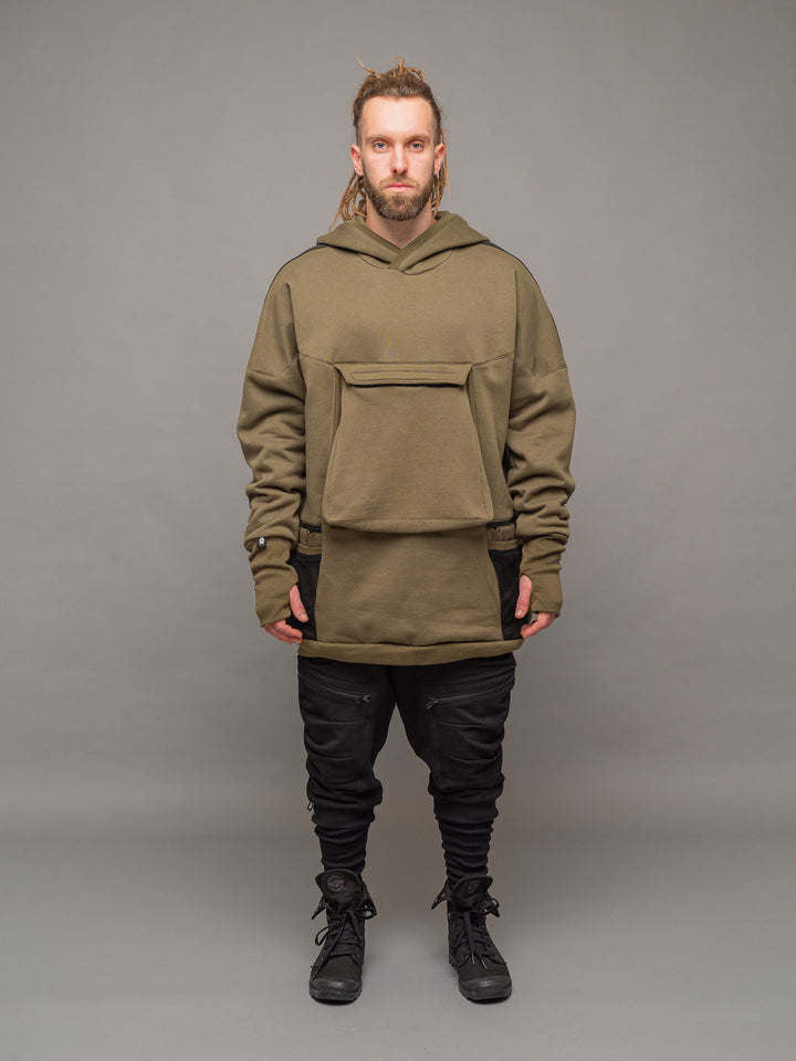 Full body image of the Colossus Hoodie styled with the Nomadix Joggers.