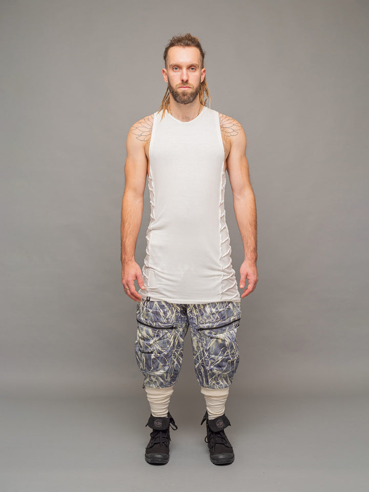 Full body view of the Poseidon denim cargo pants by Rags by Jak, styled with the Ivory Raider vest.