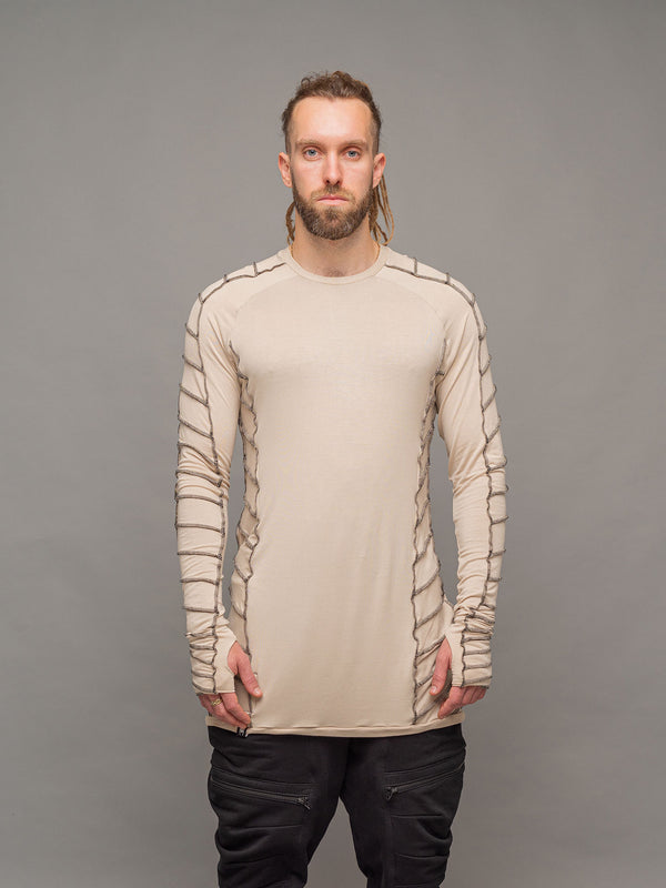 Raider dystopian avant garde men's longline t-shirt in sand with black contrast stitch and thumbholes for a distressed look - front view