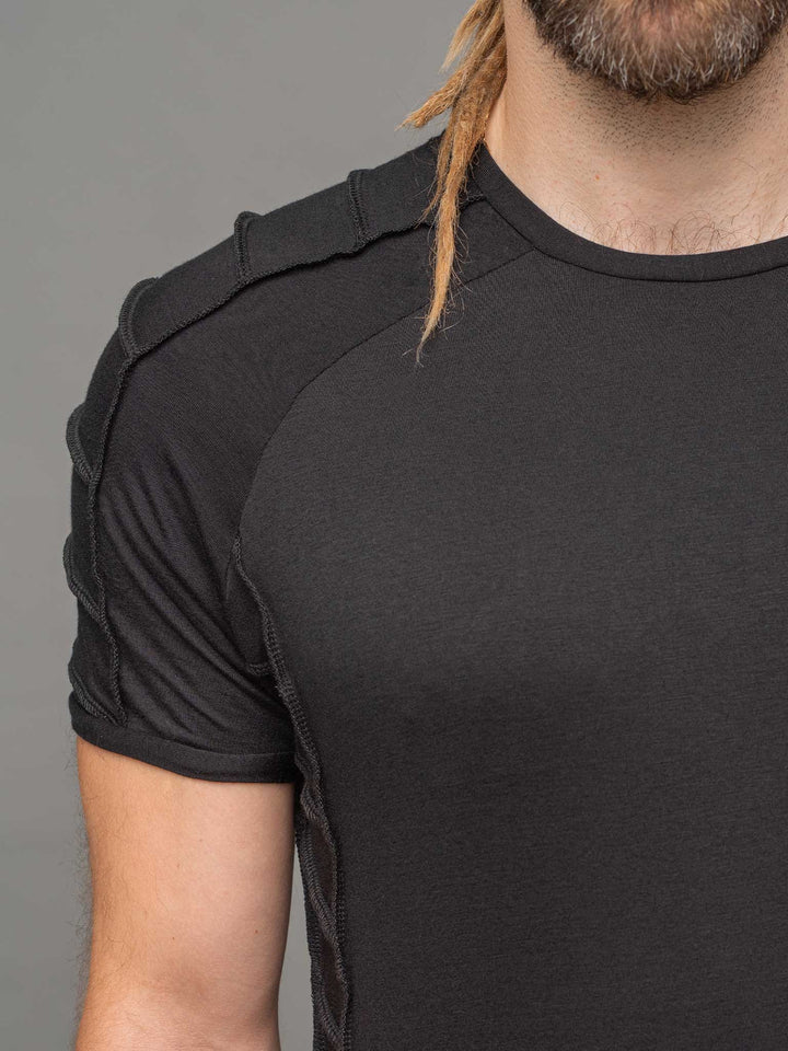 Right shoulder raglan view of the Raider short sleeve t-shirt in black