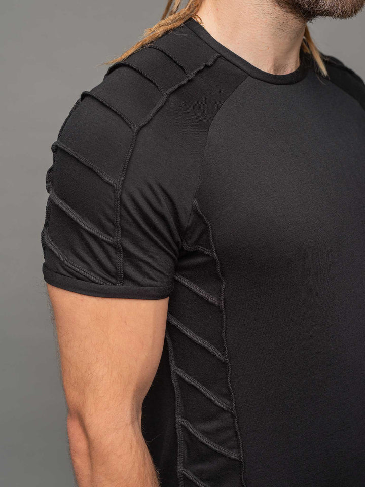 Right shoulder overlock detail view of the Raider short sleeve t-shirt in black