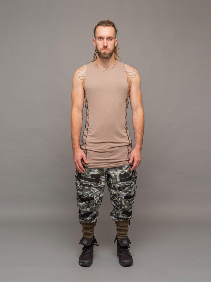 Full body view of the Raider vest in Taupe with black stitching, styled with the Stealth Cargos.