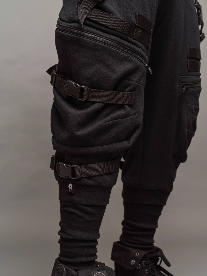zipped pocket view of the Renegade joggers in black.