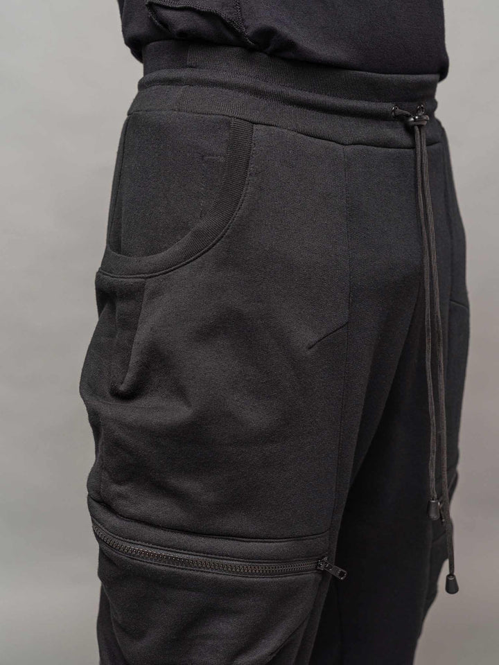 Close up top pocket view of the Ronin joggers in black.