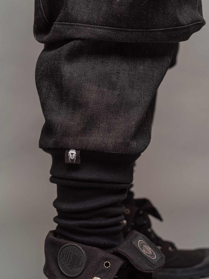Close up lower calf view of the Warlock cargo pants by Rags by Jak.