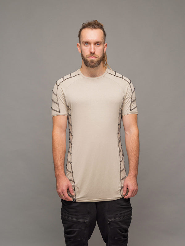 Front view of the Raider short sleeve t-shirt in sand with black stitching.