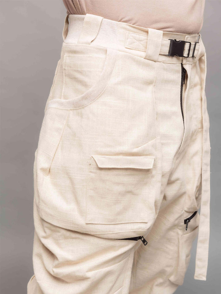 Desert Warlocks, Heavyweight linen cargo pants with 10 pockets by Rags by Jak in sand - Front hip pocket view
