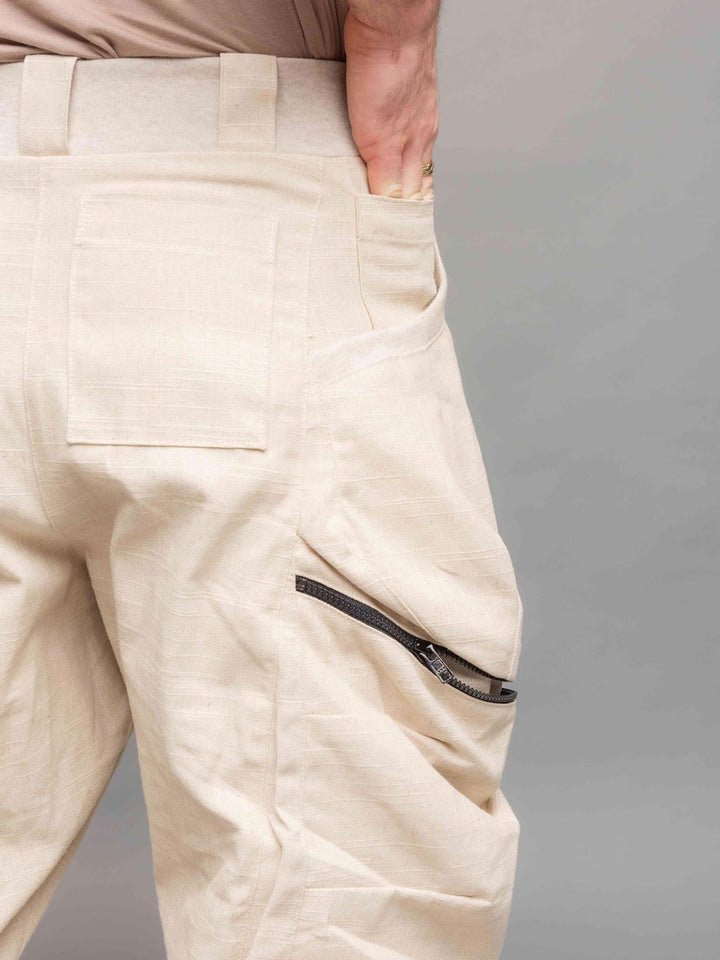 Desert Warlocks, Heavyweight linen cargo pants with 10 pockets by Rags by Jak in sand - Back pocket view