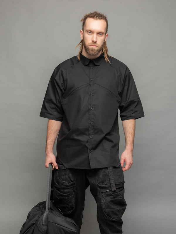 apex black oversized poplin short sleeve shirt with geometric panelled design and hidden zips by Rags by Jak- front