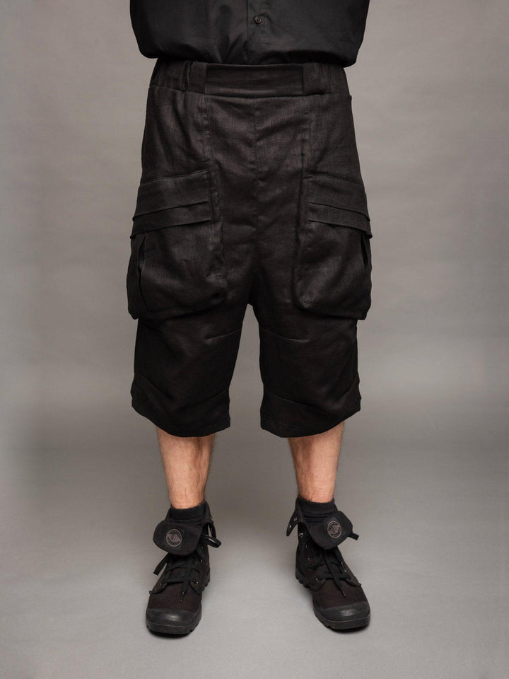 Zyrex drop crotch knee length shorts in sand with 8 pocket design - Front view