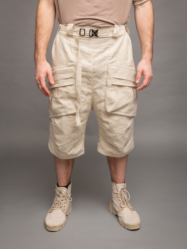 Zyrex drop crotch knee length shorts in sand with 8 pocket design - Front view