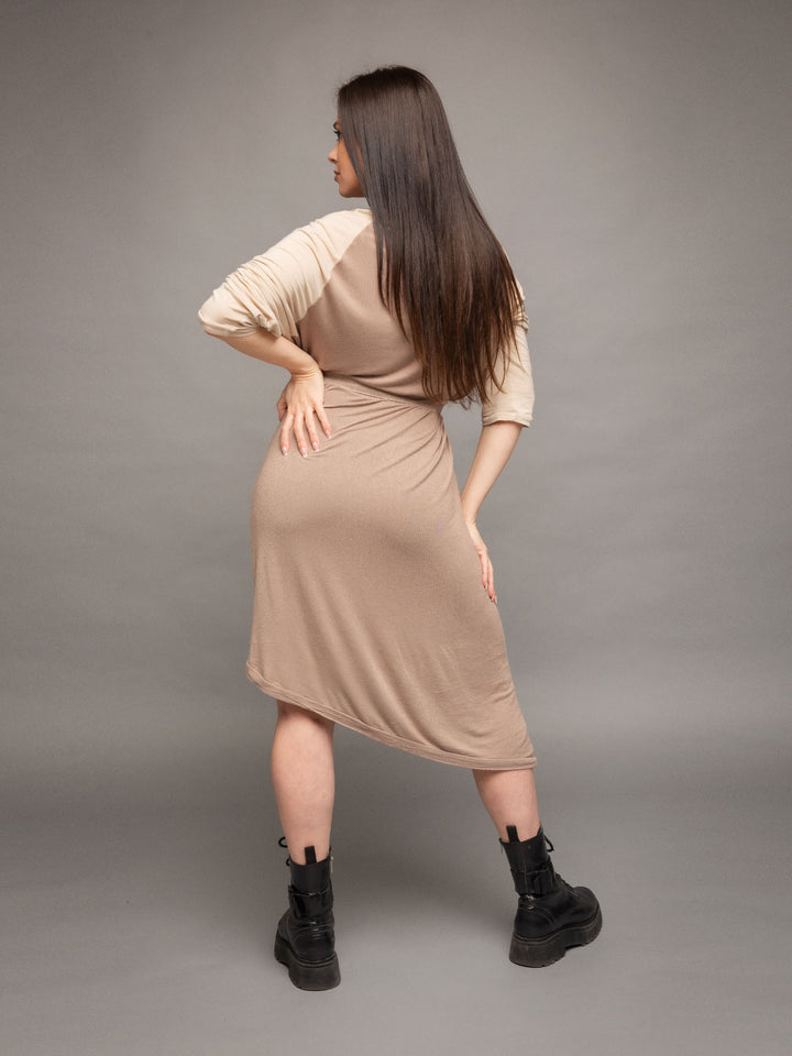 Rheya asymmetric midi dress with cowl neck and matching belt with buckle in taupe with sleeves in sand - back view