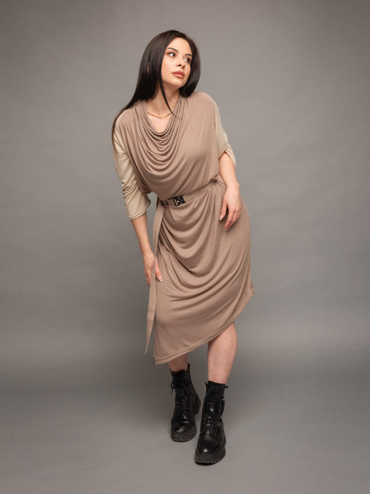 Rheya asymmetric midi dress with cowl neck and matching belt with buckle in taupe with sleeves in sand - front view pose