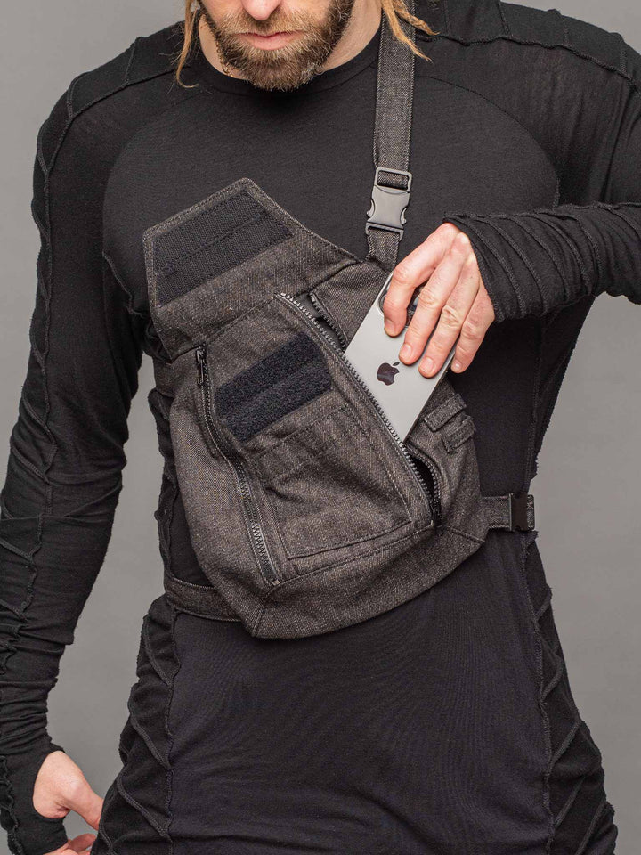 trekker crossbody denim chest bag with dual zipped opening, hidden pocket, adjustable chest and shoulder straps - front open
