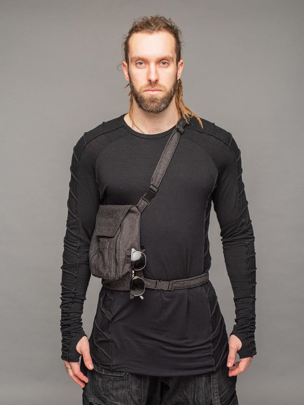 trekker crossbody denim chest bag with dual zipped opening, hidden pocket, adjustable chest and shoulder straps - front