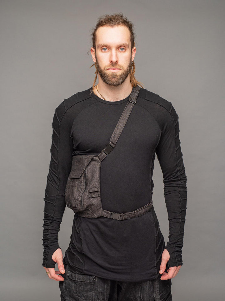 trekker crossbody denim chest bag with dual zipped opening, hidden pocket, adjustable chest and shoulder straps - front second