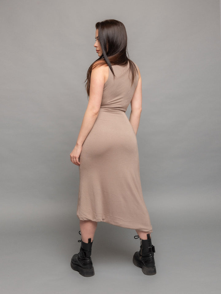 Valkiri bodycon midi dress in taupe with asymmetric hem and contrast overlock stitch details - back view