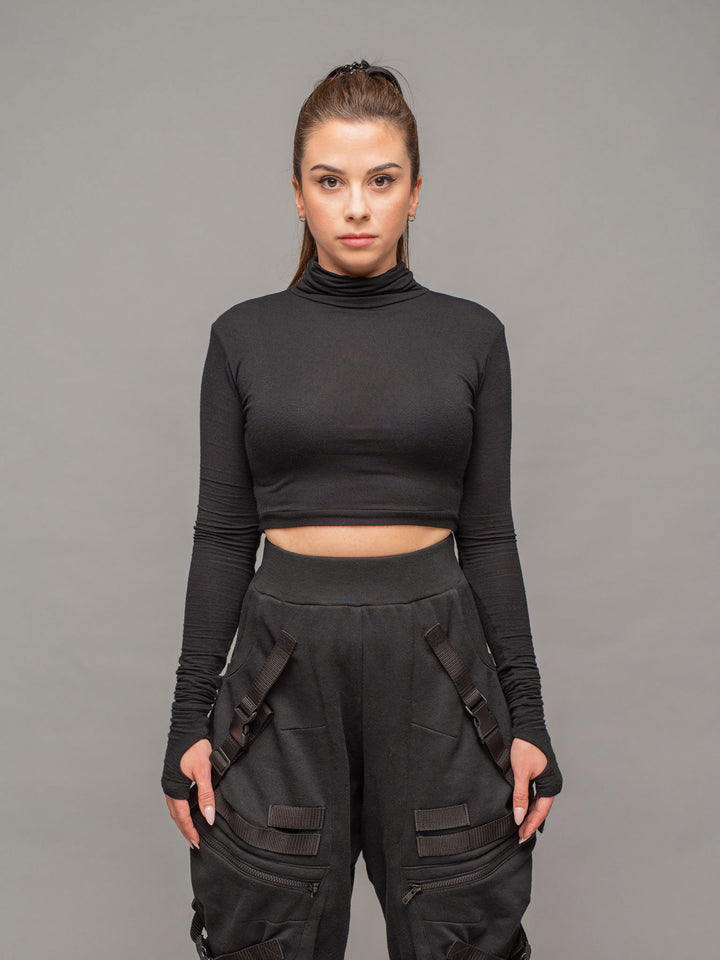 xina womens long sleeve roll neck crop top with thumbholes in black - front