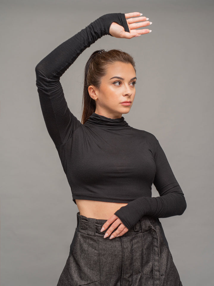 xina womens long sleeve roll neck crop top with thumbholes in black - side