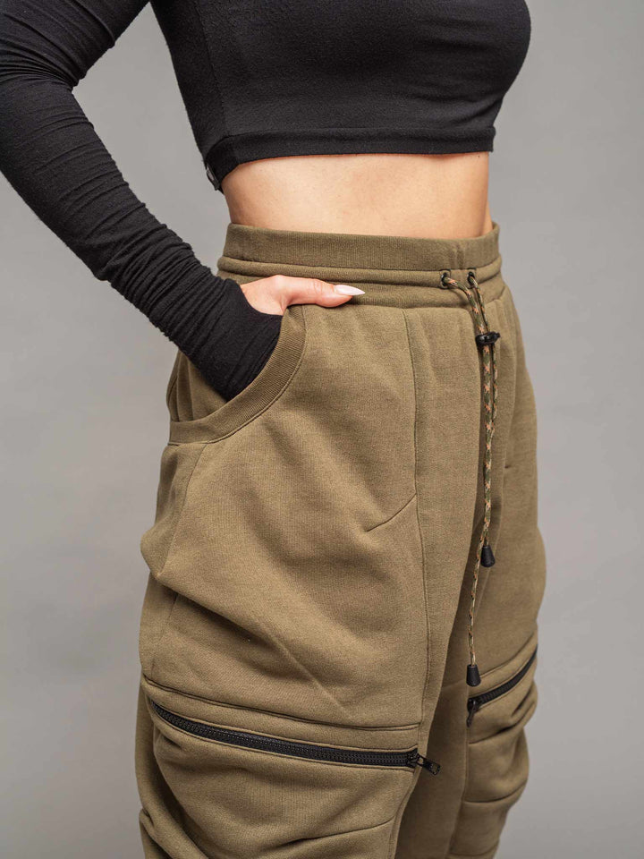 ronin women's drop crotch streetwear joggers in olive with 4 elasticated drawstring waistband, 4 pocket design and calf support - close-up view