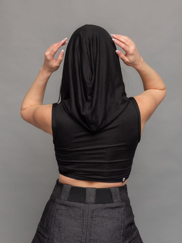 Yara avant garde hooded crop top in black - back view showing the hood